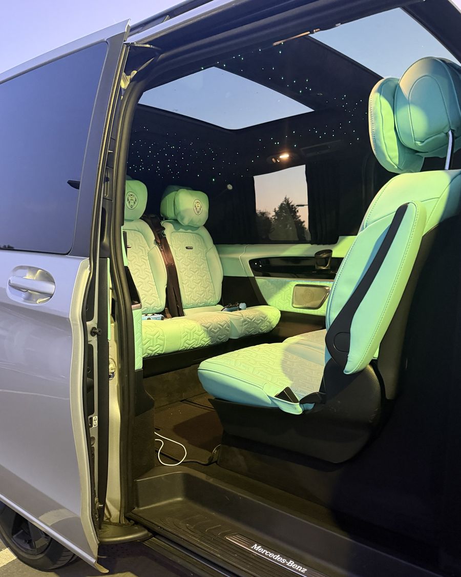 Sliding door open, turquoise interior visible